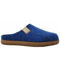 cobalt blue felt clog with a closed toe, open heel, tan logo tab, and textured brown sole, shown from the side.