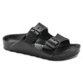 Black rubber sandal with two straps and buckle on each strap on a white background