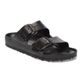 Black Birkenstock Arizona Big Buckle EVA sandal featuring two adjustable straps with oversized dark metallic buckles, a contoured footbed, and a lightweight molded EVA sole. Angled side view on a white background.
