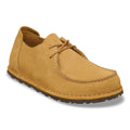 Birkenstock Utti Lace shoe in cork brown suede with tonal laces, moc-toe stitching, and a dark lug sole.