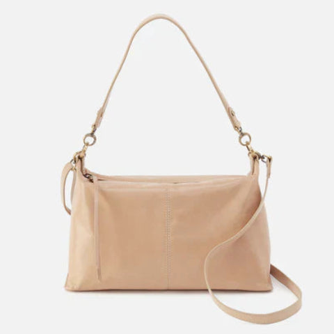 Beige handbag with a strap on a white background